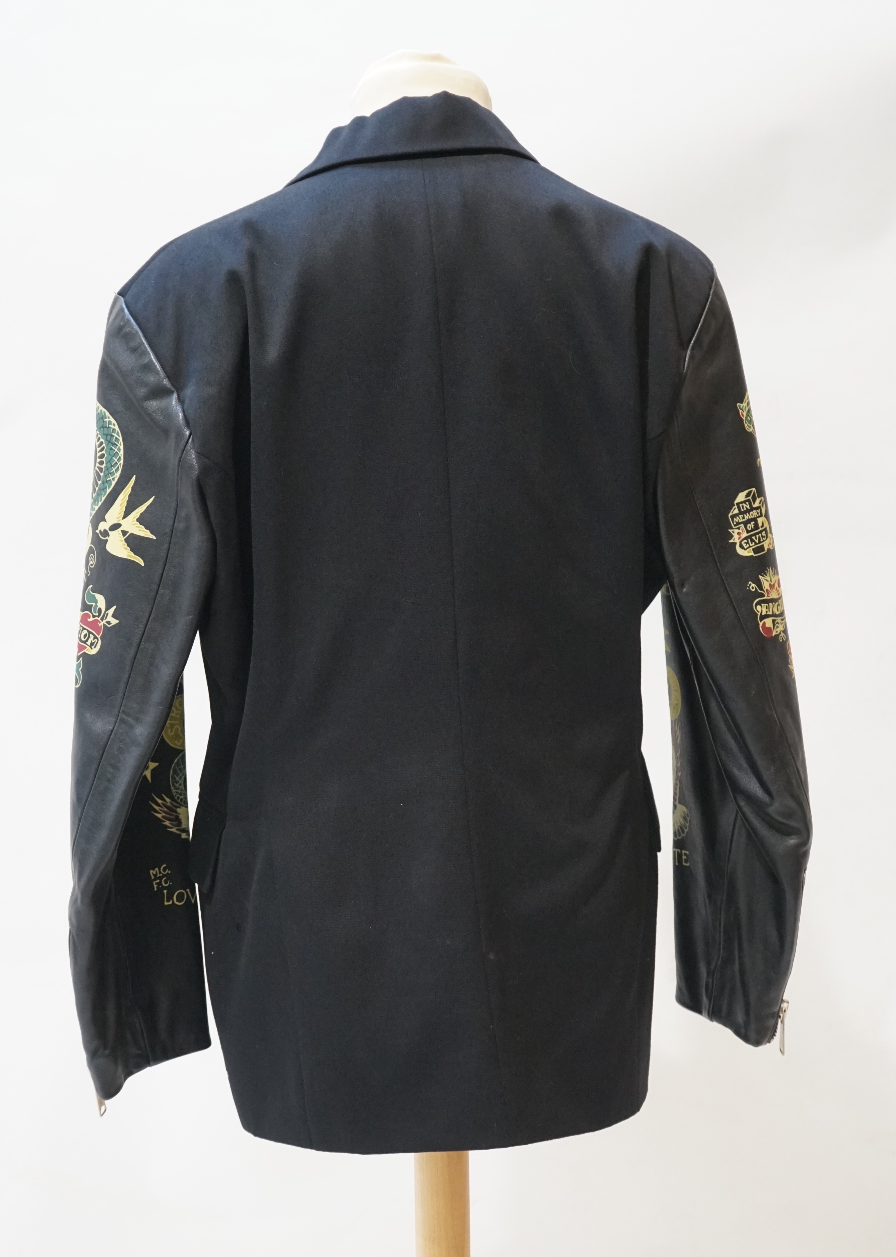 A gentleman's John Richmond double breasted wool jacket with stencilled leather arms, size M